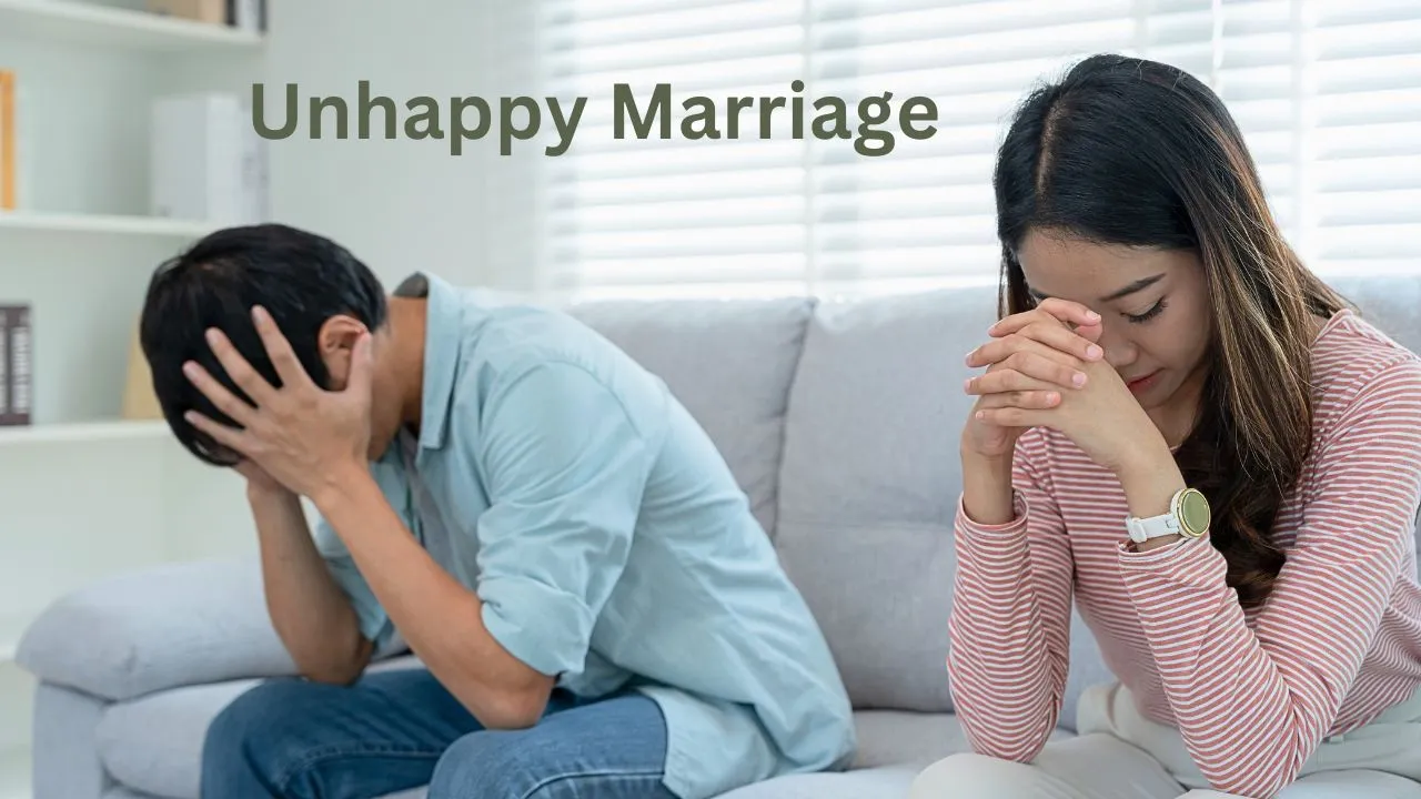 A man and a woman are sitting on a sofa and both are not happy with their marriage